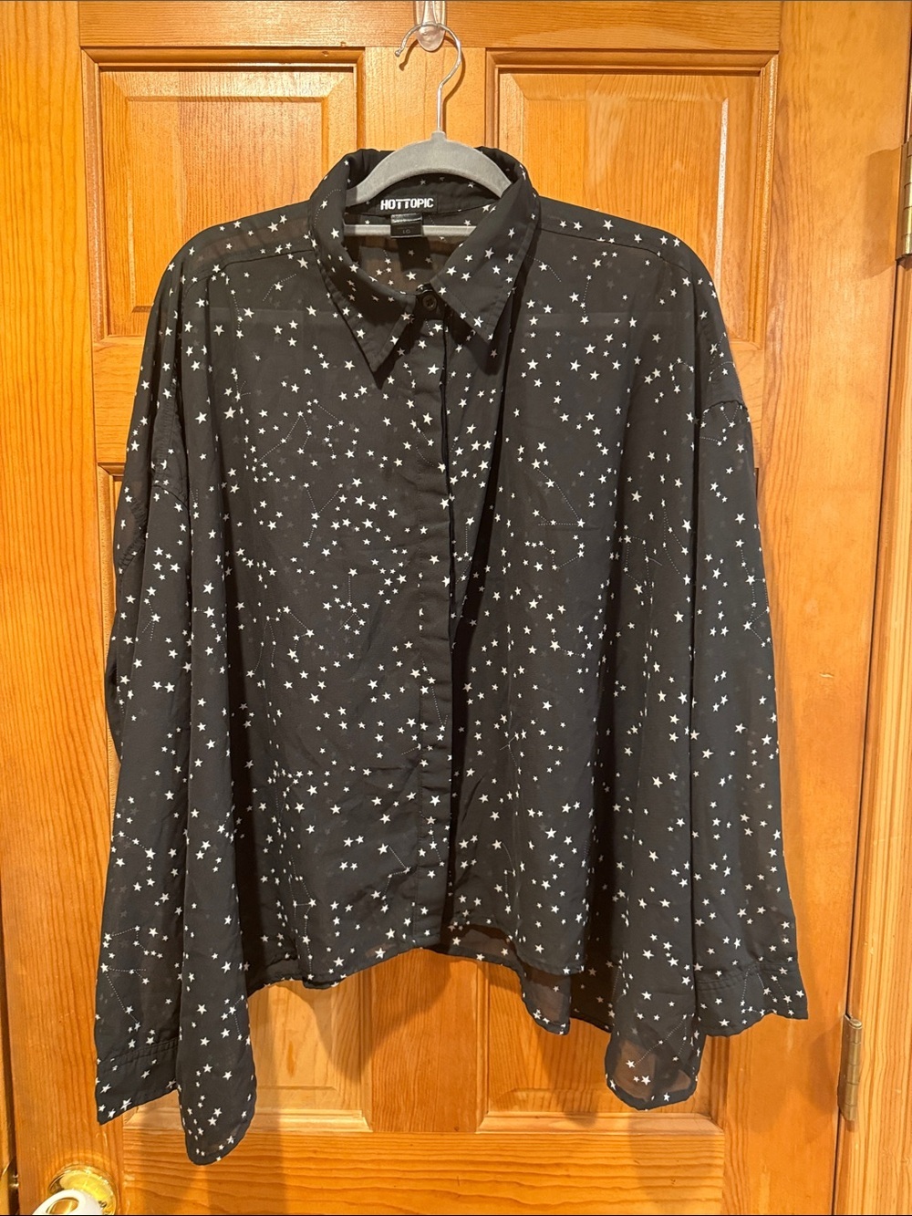 Hot topic sheer button down black with stars blouse size large .